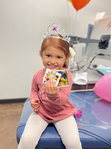 Caring for Dental Crowns Happy Phoenix Patient with Prizes